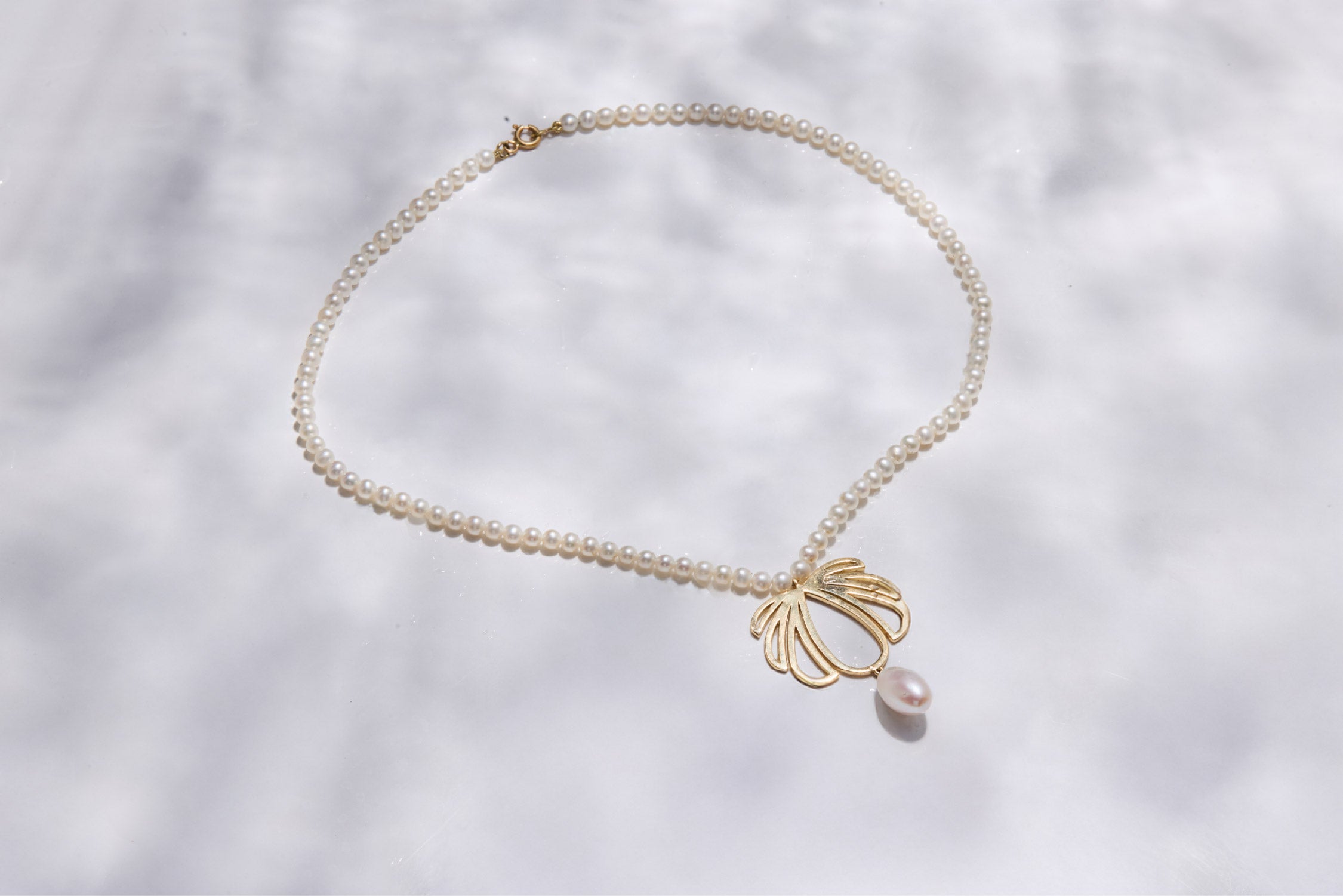 Fine Pearl Necklace with Gold Perluxe Signaturre & Oval Drop Pearl
