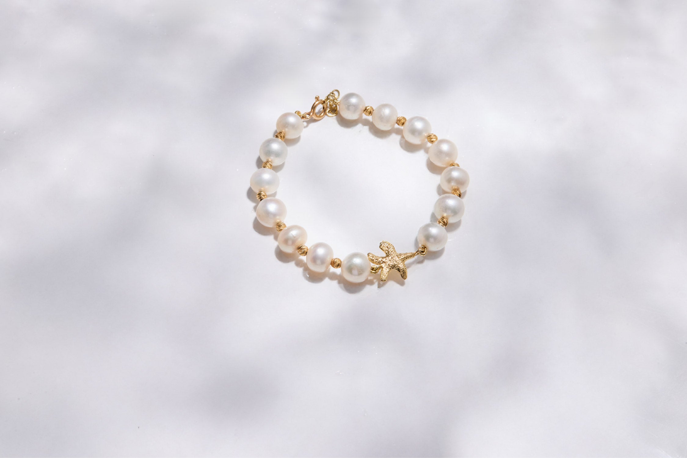 Pearl Bracelet with Gold Starfish Charm