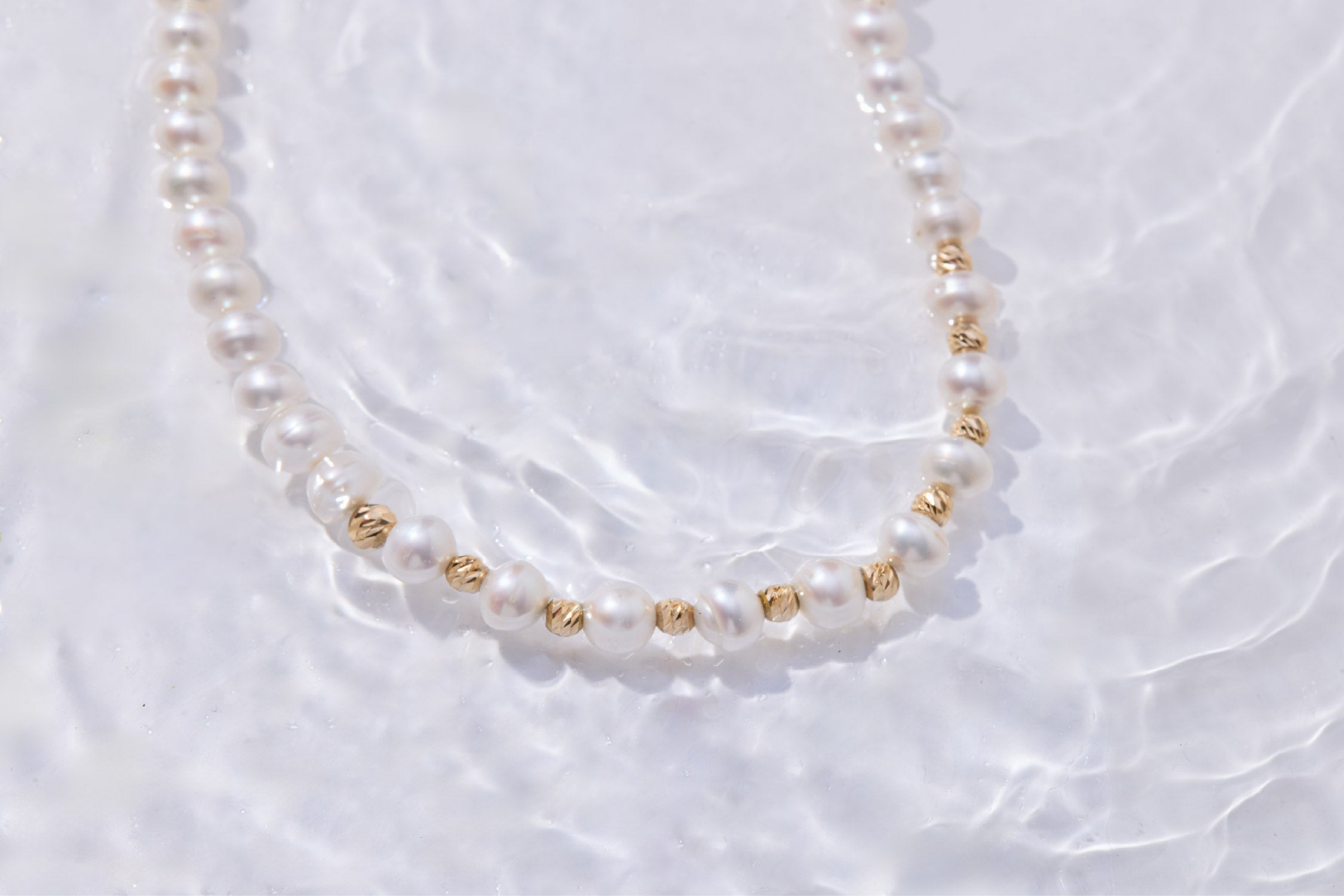 Pearl Necklace with Delicate Yellow Gold Accents