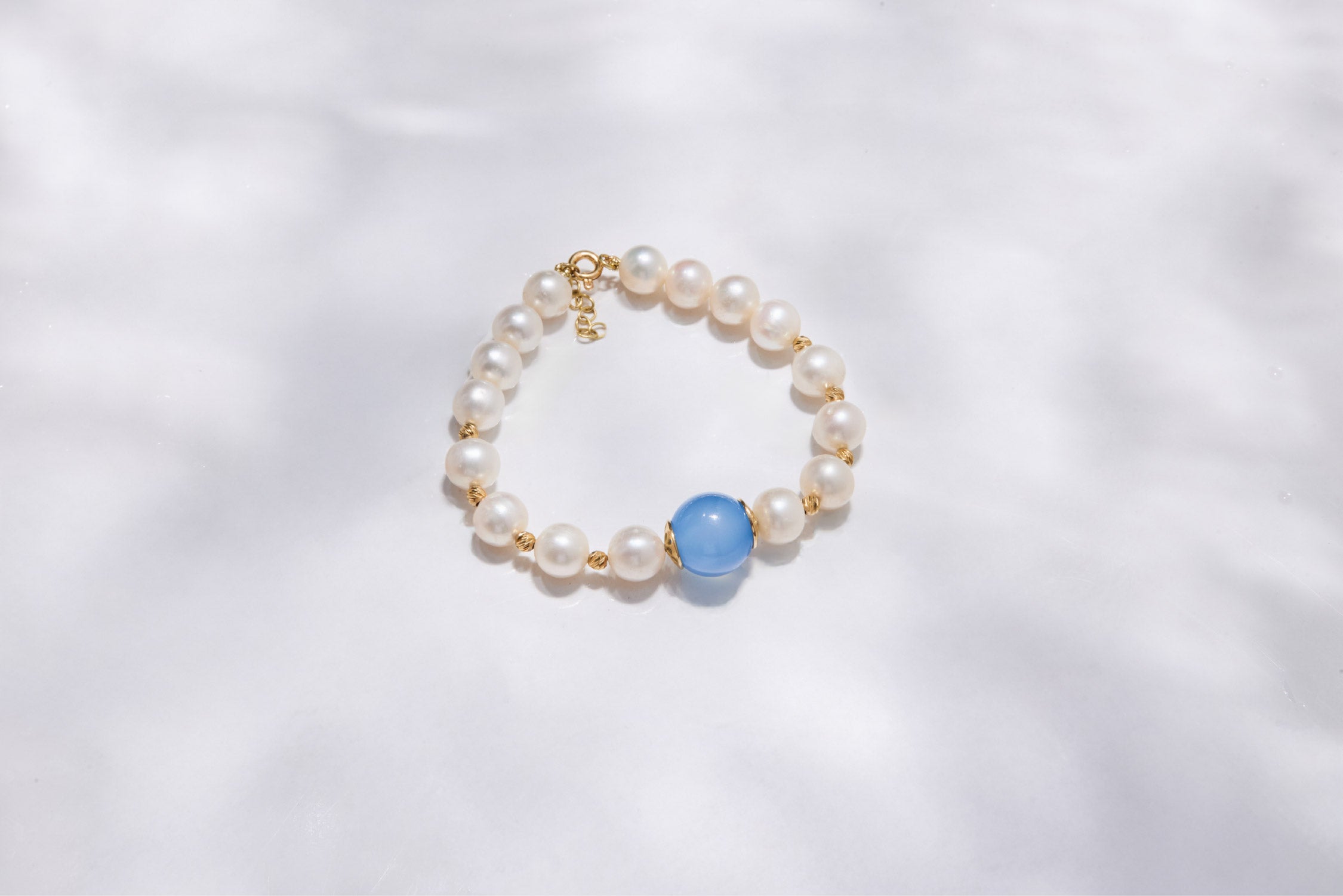 Pearl Bracelet with Ocean Blue Stone