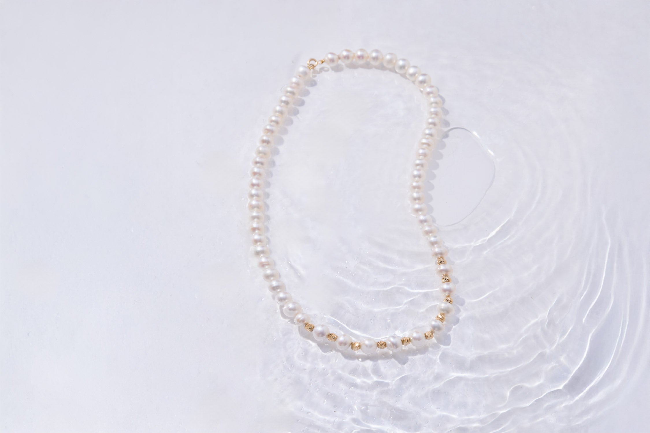 Pearl Necklace with Delicate Yellow Gold Accents
